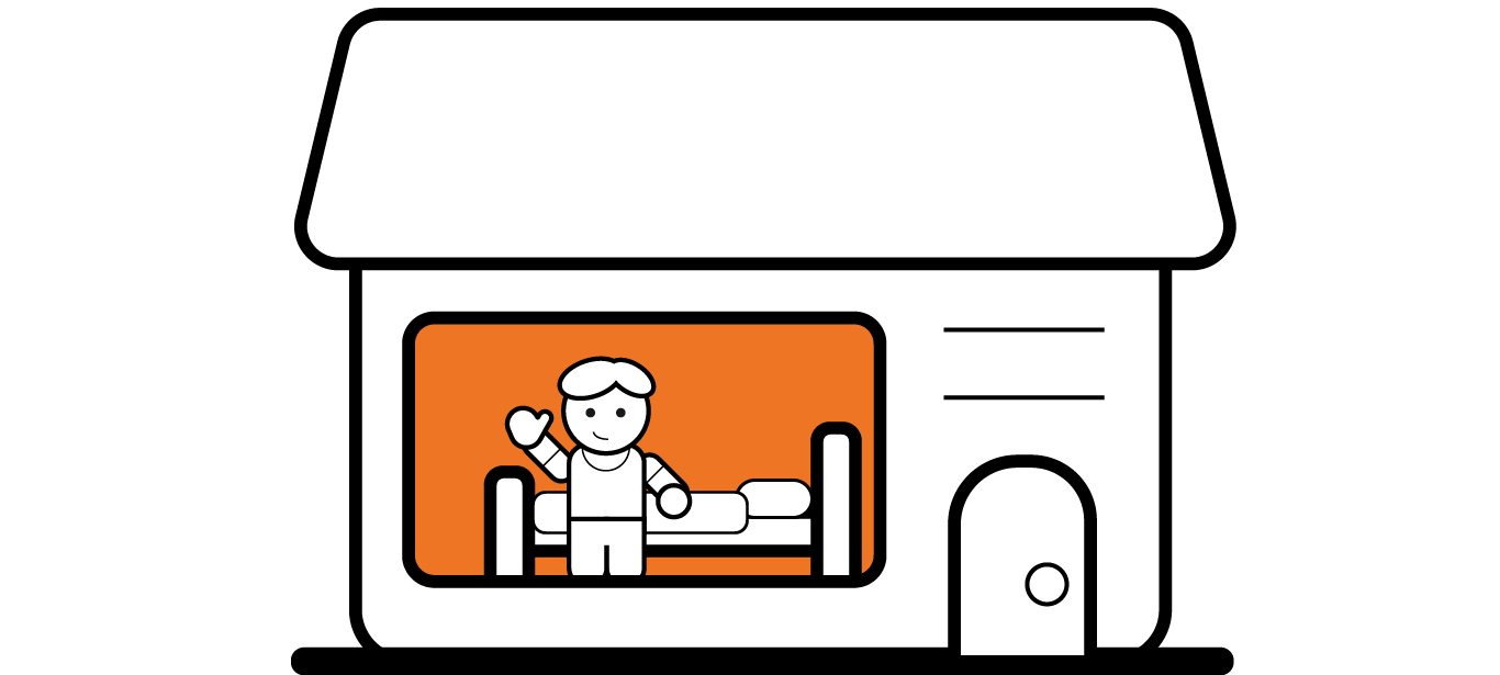 Man in hotel room with bed